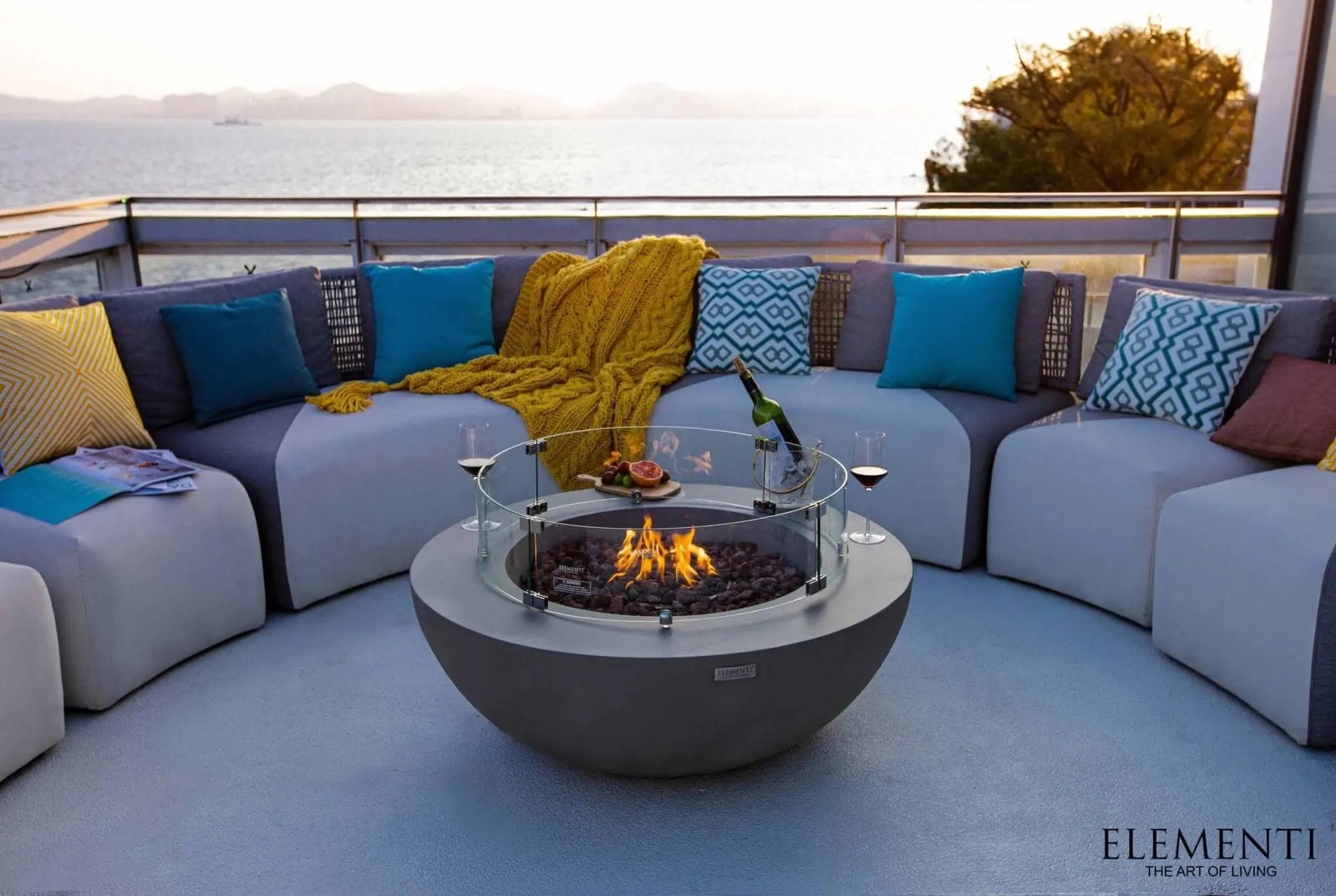 Lunar Bowl sculptural GFRC fire table with 45,000 BTU gas burner