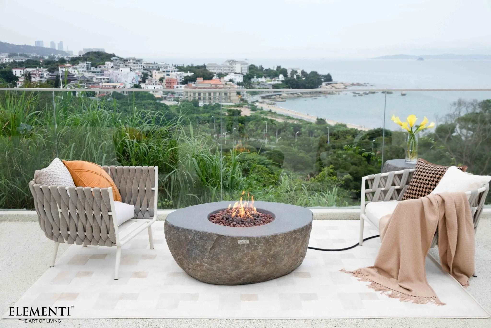 Boulder 43 inch concrete fire table with rugged textured finish