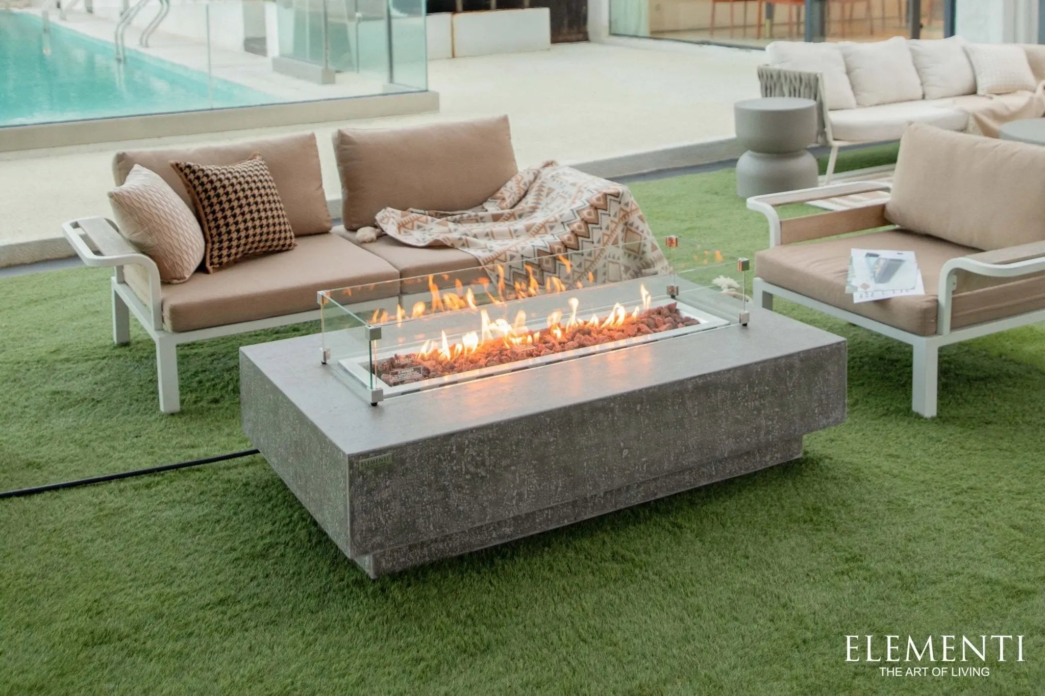 Hampton 56 inch concrete fire table for large outdoor entertaining spaces