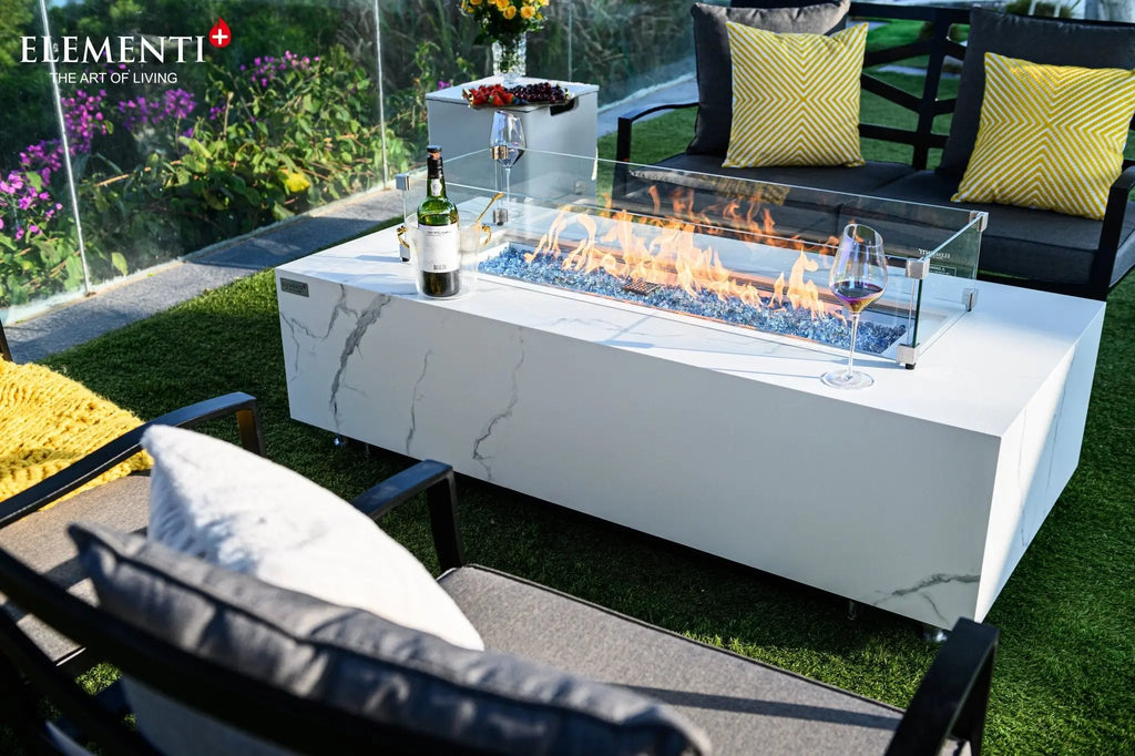 Carrara fire table in Bianco White marble porcelain, Elementi Plus flagship outdoor fire feature