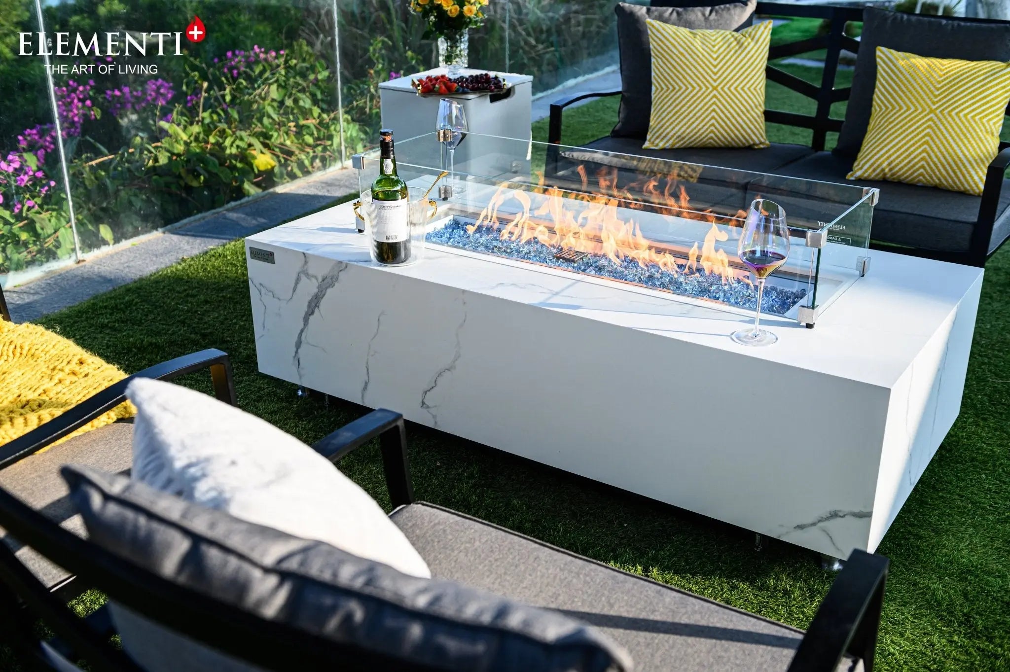 Carrara fire table in Bianco White marble porcelain, Elementi Plus flagship outdoor fire feature