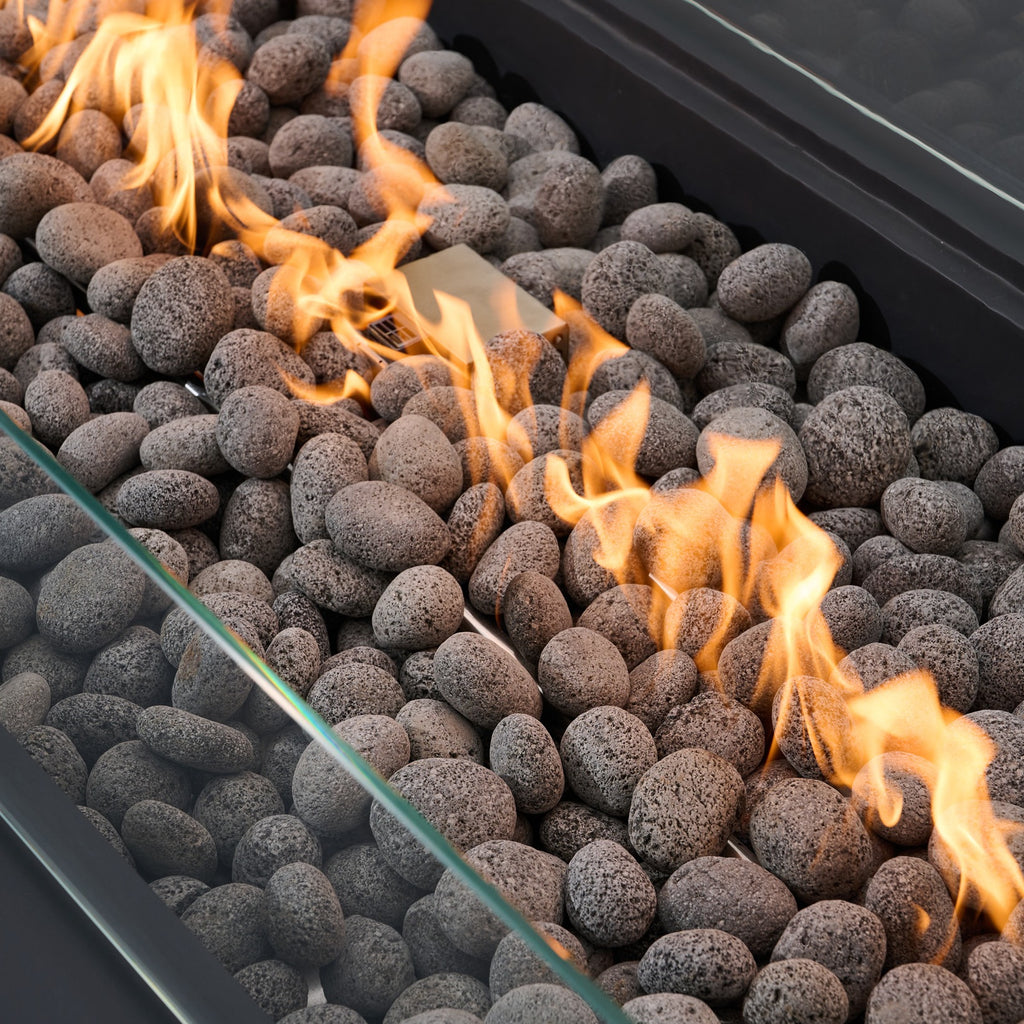 Elementi Pro Ravello 72-inch rectangle fire pit, Dark Gray – close-up of flames over lava rock