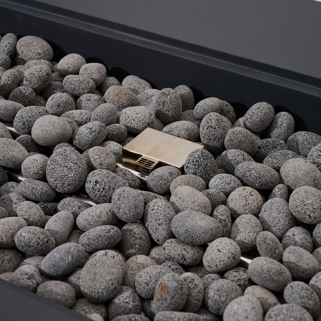Elementi Pro Ravello 72-inch rectangle fire pit, Dark Gray – burner pan and lava rock close-up