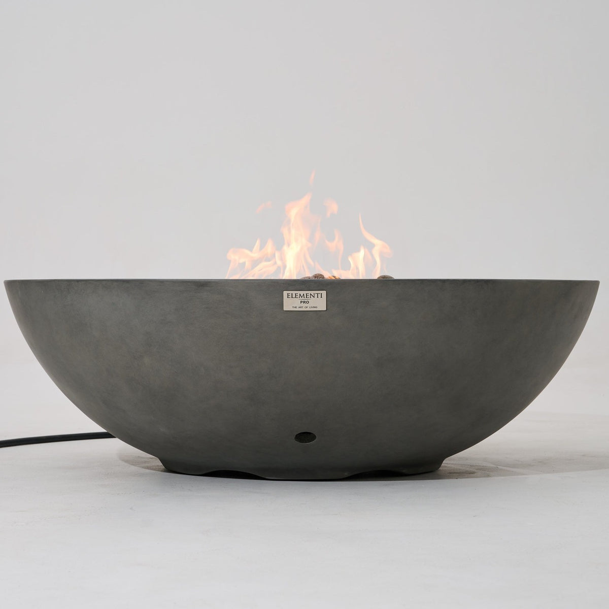 Elementi Pro Rose Bowl 48-inch 100K BTU fire pit, Moon Gray – low side profile, lit